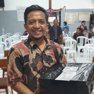 man holding a shoe box